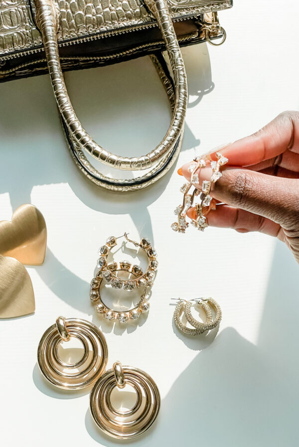 The Best Ways To Layer Your Jewelry Like A Pro