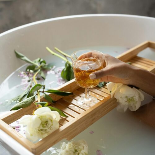 Photo by Monstera Production from Pexels: https://www.pexels.com/photo/woman-with-wineglass-and-flowers-in-bathtub-6621173/